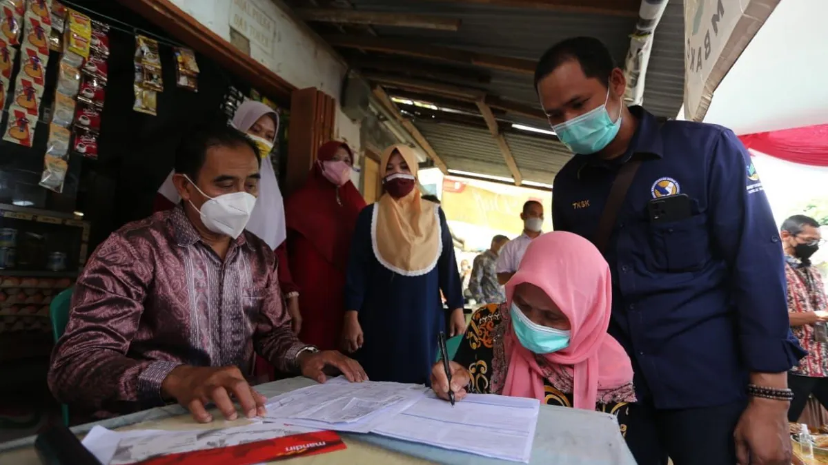 Pencairan bansos PKH dan BPNT via KKS ATM Merah Putih Bank Himbara dan BSI