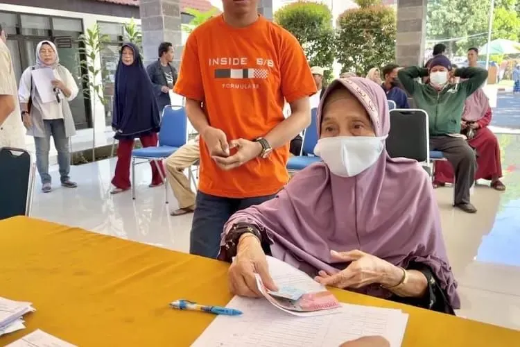 Ilustrasi Pencairan bansos PKH dan BPNT