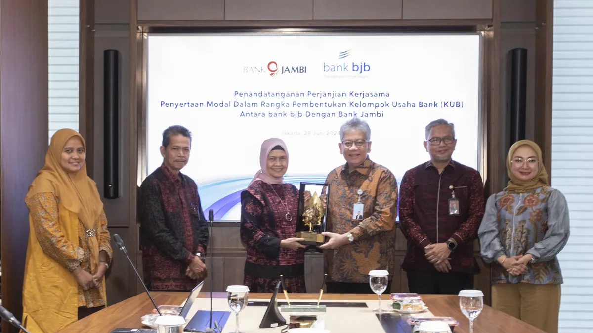 bank bjb kembali menorehkan milestone baru pengembangan KUB melalui penandatanganan Perjanjian Kerja Sama (PKS) penyertaan modal dengan Bank Jambi.
