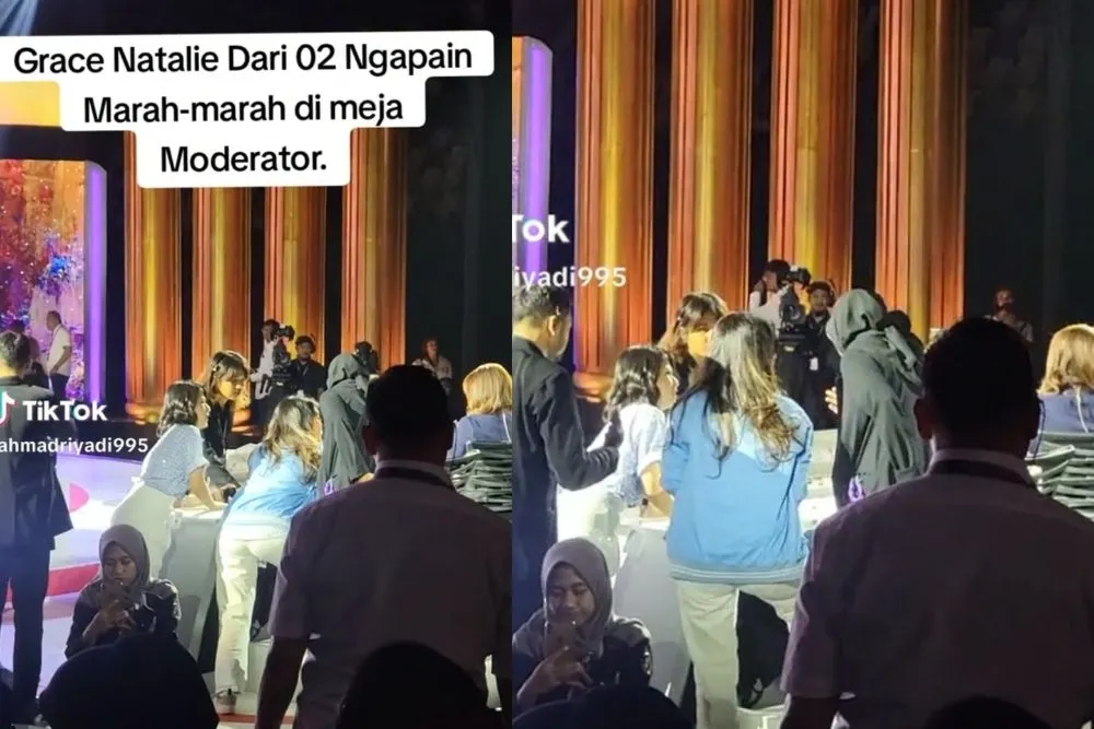 Grace Natalie selaku Wakil Ketua Dewan Pembina Partai Solidaritas Indonesia (PSI) tampak menghampiri meja moderator saat jeda debat capres.