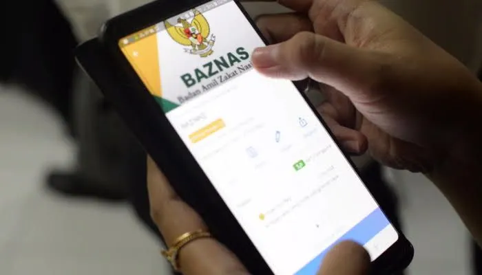 Ilustrasi hukum dan cara bayar zakat fitrah online melalui Baznas.