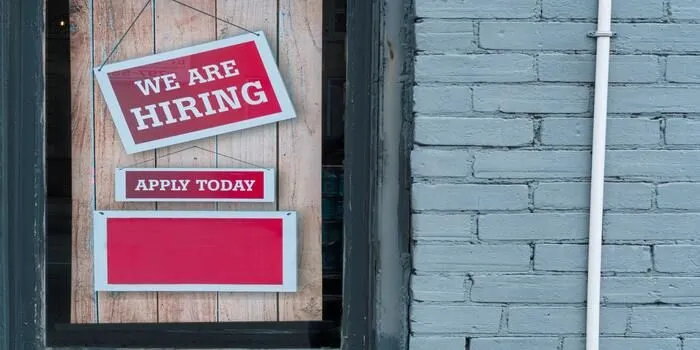 Hiring sign (Unsplash/Eric Prouzet)