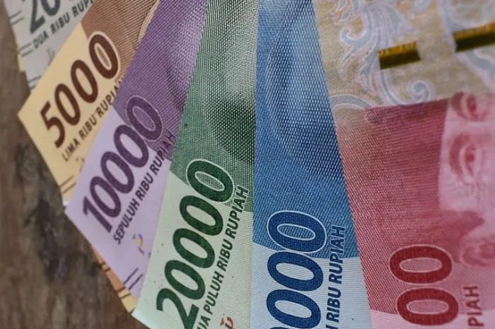 Ilustrasi bantuan sosial atau bansos tambahan sebesar Rp4,2 juta bagi anggota PKH hanya dengan mengecek Kartu Keluarga (KK).