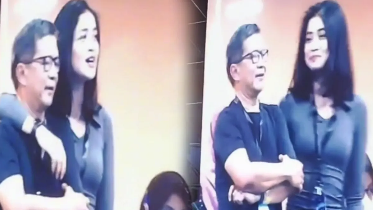 Potret Rocky Gerung yang dirangkul mesra oleh wanita cantik saat menonton konser Dewa 19.(Tangkap Layar TikTok)