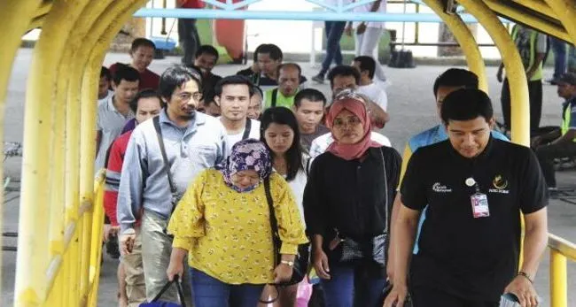 Ilustrasi pekerja migran Indonesia kembali ke Tanah Air.