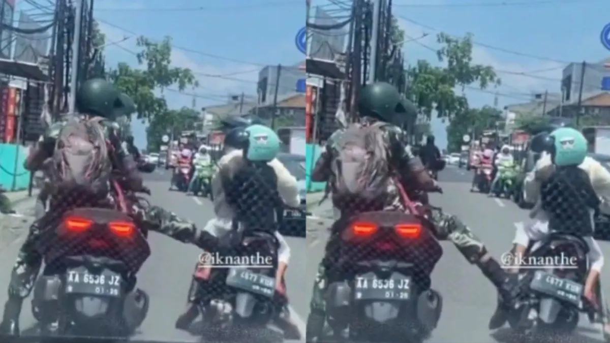 TNI berseragam tertangkap video sedang menendang sepeda motor Ibu-ibu