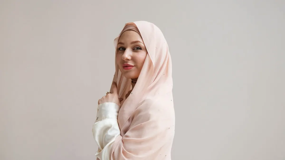 Ilustrasi baju kebaya modern dengan hijab untuk pesta pernikahan.