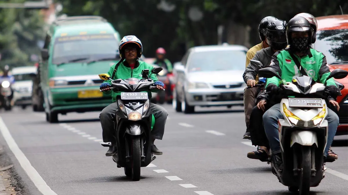 Ilustrasi tips ampuh ngebid ojol gacor di Jakarta untuk meraih pendapatan maksimal jelang Lebaran.