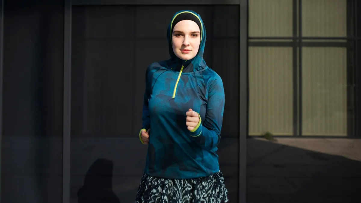 Ilustrasi outfit jogging hijab.