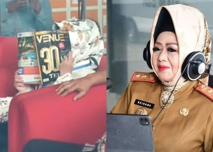 Reihana tutupi wajahnya dengan majalah saat berada di KPK.