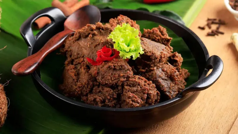 Ilustrasi resep rendang daging sapi empuk khas Padang asli yang dapat Anda coba di rumah.