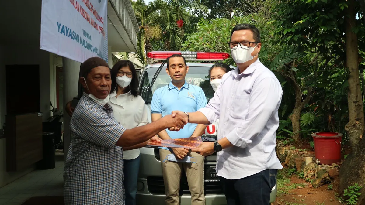 Aksi PNM yang Memberikan Bantuan Ambulans menyambut Hari Lahir Pancasila.
