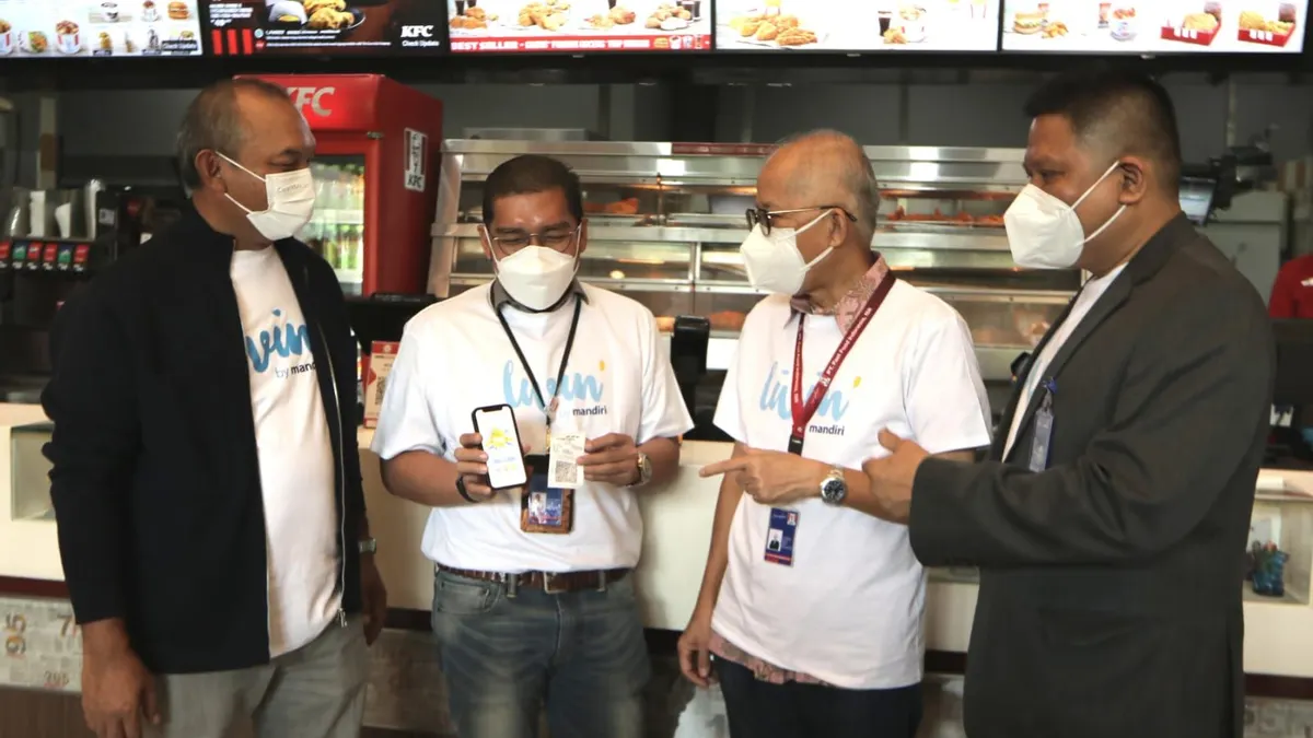Bank Mandiri menggandeng dua restoran cepat saji KFC dan Taco Bell yang bernaung di bawah PT Fast Food Indonesia Tbk (FAST). (dok. Bank Mandiri)