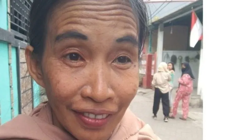 Ani Fina, seorang ibu yang wajahnya mirip dengan Presiden Jokowi