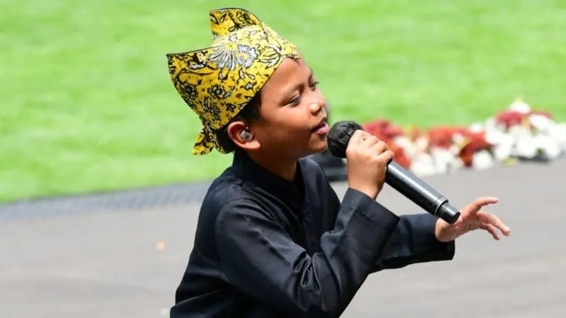 Farel Prayoga bernyanyi di hadapan Presiden Jokowi