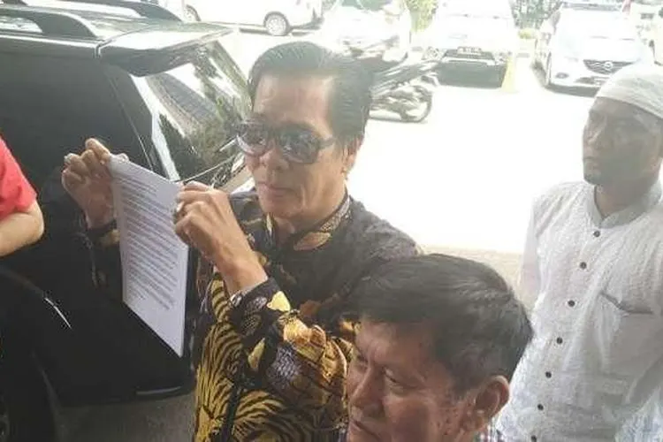 Ketua Persatuan Islam Tionghoa Indonesia Anton Medan di Polda Metro Jaya [suara.com/Agung Sandy Lesmana]