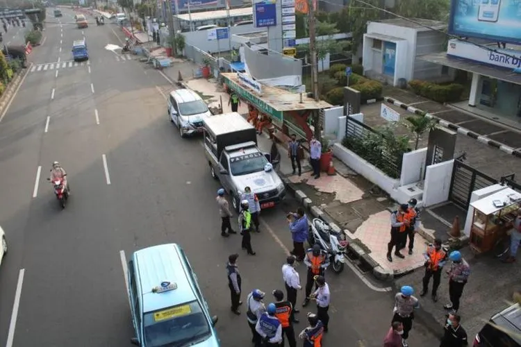 Parkir Sembarangan di Margonda Siap-siap Digembok dan Dikempesin (Republika)