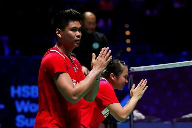 Ganda campuran Indonesia, Praveen Jordan dan Melati Daeva Oktavianti, melaju ke partai final Thailand Open 2021. (ilustrasi) / Foto: Antara via Reuters/Andrew Boyers