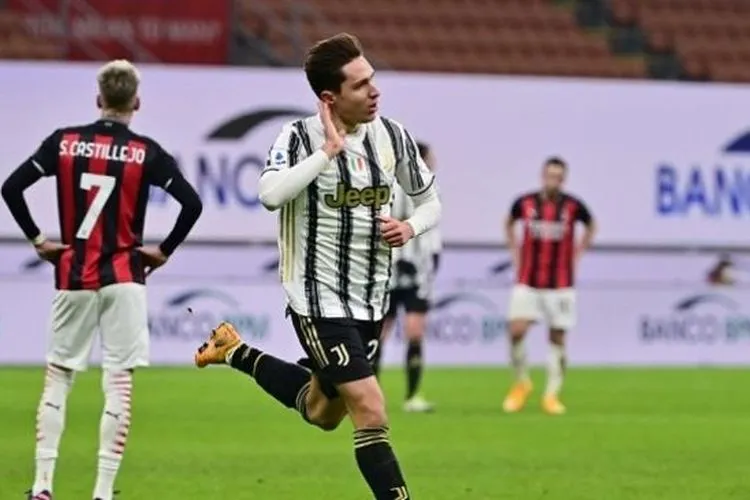 Federico Chiesa mencetak dua gol Juventus ke gawang AC Milan di San Siro, Kamis (7/1/2021) dini hari WIB. (Foto: AFP)