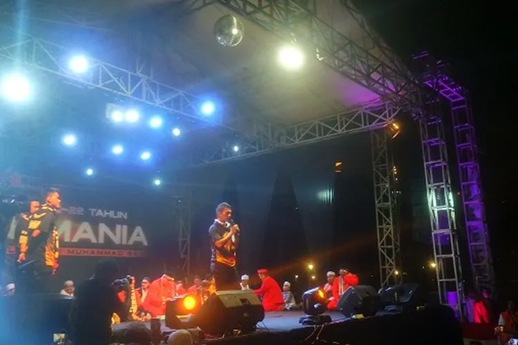 Ismed Sofyan memberikan kata sambutan dalam acara tasyakuran milad ke-22 The Jakmania yang berlangsung di kawasan Monas, Jakarta Pusat. (Ayojakarta.com/Hendy Dinata)