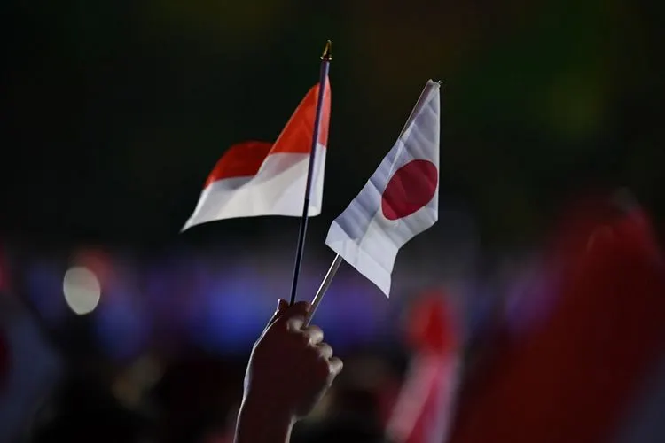 Ilustrasi bendera Indonesia dan Jepang/AFP (Jewel Samad)