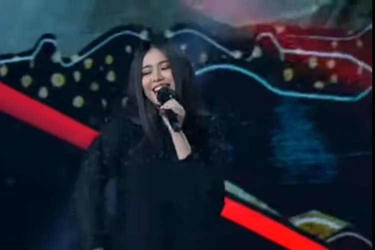 Penampilan Melisa saat menyanyikan Los Dol di panggung spekta Indonesian Idol, Senin (8/2/2021). (tangkapan layar)