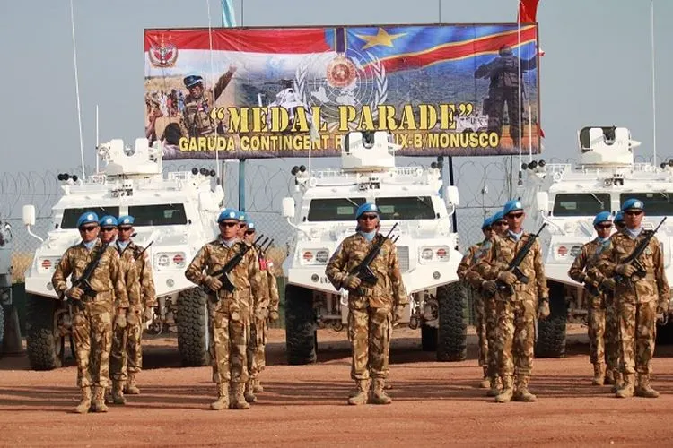 Suasana pemberian penghargaan medal parade dari PBB kepada 850 prajurit TNI di Kongo. (dok Papen Satgas TNI Konga XXXIX-/RDB Monusco)