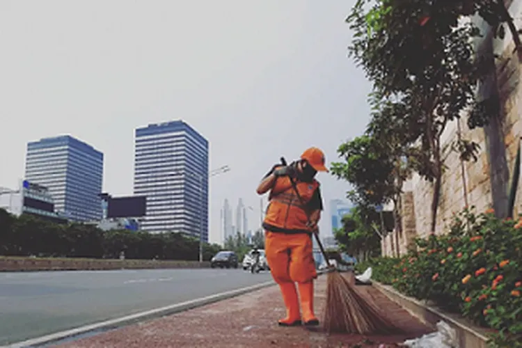 ilustrasi petugas PPSU DKI Jakarta/ Suara.com