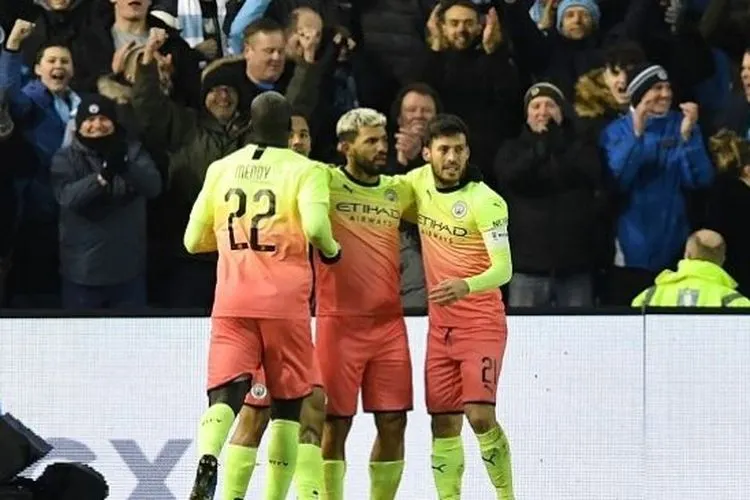 Striker Sergio Aguero merayakan gol ke gawang Sheffield Wednesday dan memastikan Manchester City lolos perempat final Piala FA, Kamis (5/3/2020) dini hari WIB. (AFP)