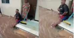 Viral Video Aksi Terpuji Anak Pada Ibunya Nahan Air Banjir Agar Tak Masuk Rumah, Warganet: Bukti Baktimu Bang!