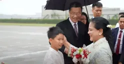 Viral Momen Manis Ibu Negara Iriana Joko Widodo Usap Wajah Anak yang Kehujanan saat Kunjungan Kerja ke China