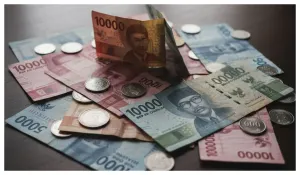 Ilustrasi. Uang Rupiah- Kenaikan UMP Jakarta 2026 (Sumber: Gemini AI)