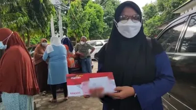 Ilustrasi. KPM Bansos PKH dan BPNT