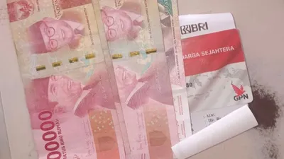 Ilustrasi uang tambahan untuk golongan KPM dalam pencairan bansos PKH berikut ini