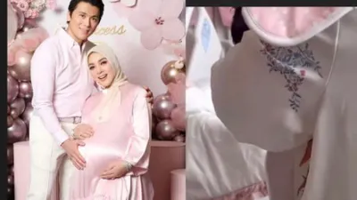 Rambut Baby R Anak Syahrini Kelihatan Sedikit saat Digendong