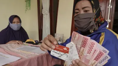 Kemensos RI akan mencairkan bansos PKH tahap 2 periode Maret-April di KKS ATM Merah Putih Bank Himbara atau BSI.