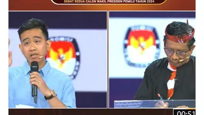 Gibran Rakabuming dan Mahfud MD saat debat Cawapres Jumat 22 Desember 2023