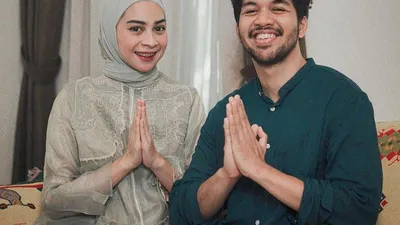 FOTO KELUARGA: Ira Nandha (kiri) dan Elmer Syaherman (kanan)