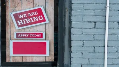 Hiring sign (Unsplash/Eric Prouzet)