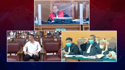 JPU tegur eks Kasubnit I Subdit III Dittipidum Bareskrim Polri Irfan Widyanto terlihat cengengesan saat persidangan berlangsung.