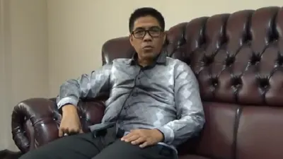 Potret, Syahruddin M Noor, Ketua DPRD PPU laporkan FA atas dugaan kasus penyebaraan video porno.
