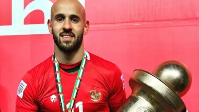 Mohammed Rashid gunakan jersey Timnas.