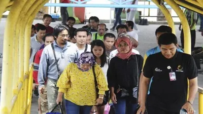 Ilustrasi pekerja migran Indonesia kembali ke Tanah Air.