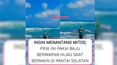 Viral di sosial media, seorang pemuda mengenakan pakaian warna hijau di pantai selatan. 