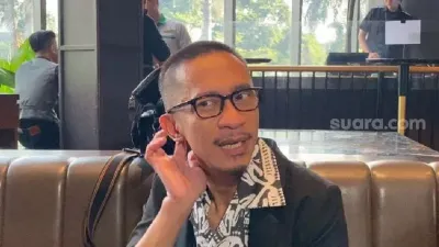 Aming tampil lebih maskulin