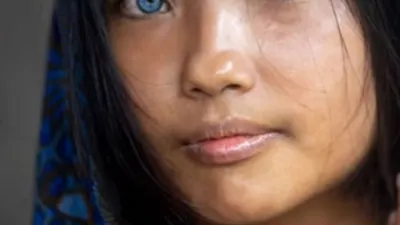 Evi Gadis Cantik Bermata Biru yang Jadi Incaran Fotografer Dunia