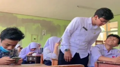  Husein Ali Rafsanjani ASN Guru yang Melaporkan Kasus Pungli