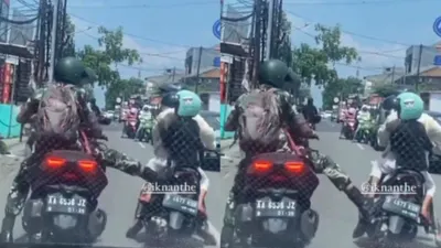 TNI berseragam tertangkap video sedang menendang sepeda motor Ibu-ibu