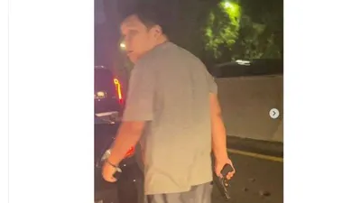 Pengendara Berplat Dinas Polri Todongkan Pistol ke Pengendara Taksi Online