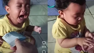 Video Viral Aksi Gemas Seorang Balita yang Berhenti Menangis Saat Diberi Uang 100 Ribu